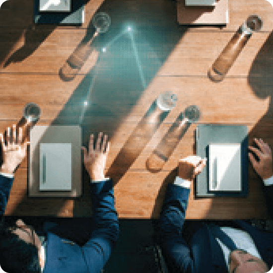 Effective Governance and Board Oversight in a Globalized Information Environment - people sitting at conference table